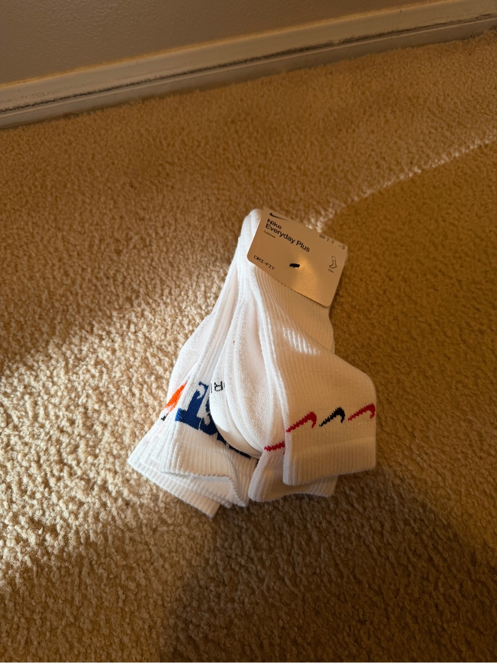 Nike White Crew Athletic Socks with Red and Blue Accents